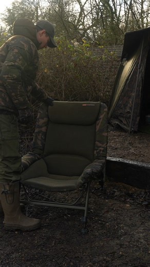 The most comfortable Chair we have ever made! 🤩 Experience the ultimate comfort with the Fox Super Deluxe Arm Chair - Boasting deep-fill, high-density foam padding and reinforced impact zones, extra-padded headrest and fleece inner mattress. This chair is undeniably the epitome of coziness! 😍 It cradles your body, while the snug armchair-style design eliminates drafts for a truly luxurious experience. Trust us, you won't find a more comfortable chair for your carp fishing sessions 😴 | Fox Int