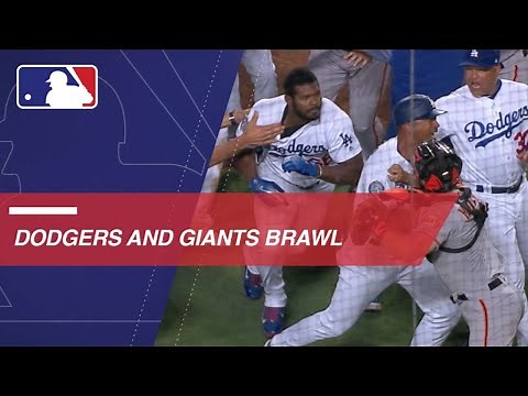 Benches clear after Yasiel Puig, Nick Hundley get into confrontation