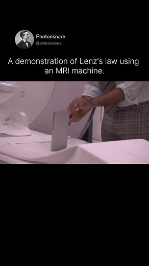 Lenz's Law states that an induced current will always flow in a direction that opposes the change in magnetic flux that caused it. This principle is commonly demonstrated with simple experiments like dropping a magnet through a copper tube, but an MRI machine provides a much more powerful and large-scale example. MRI machines generate extremely strong magnetic fields, and any conductive material moving within that field will experience induced currents that resist motion, following Lenz’s Law. A