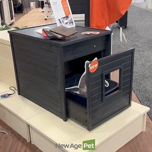 We just HAD to show off our New Age Pet® Freedom Litter Loo® (patent pending) at SuperZoo! This larger litter box enclosure features a sliding drawer, making cleanup a breeze. Simply pull out the compartment, scoop, and roll it back into place with the secure magnet closure. It's made with ECOFLEX®, our proprietary composite blend of recycled polymers and reclaimed wood fiber by-products, which is odor-resistant and moisture-resistant. At New Age Pet® we believe pet furniture should be stylish a