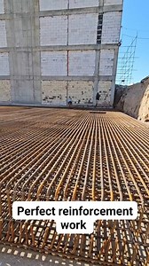 a reinforced concrete column under construction. It is a structural member designed to carry compressive loads. Key features include: Steel Reinforcement: A network of steel bars (rebar) provides tensile strength, preventing cracking and buckling. Formwork: Wooden planks create a mold for the concrete, ensuring the desired shape and size of the column. Spacers: Small, circular spacers maintain the correct distance between the rebar and the formwork, ensuring proper concrete coverage. Load Transf