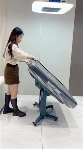 This video shows an automatic mahjong table that can be folded for storage.