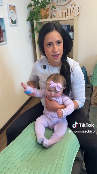I can’t tell what’s cuter: her smile or her chasing the finger glove! 😋 #MommasChiro #DrAimee #Chiropractic #Adjustment #ASMR #FYP