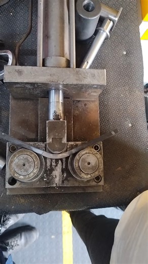 IN METALLURGICAL TESTING LABORATORY PERFORMING WELD DUCTILITY CHECK ON GMAW WELDED ALLOY STEEL