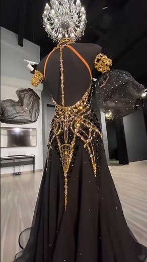 Get Ready to Shine in the Glamorous Black and Gold Ballroom Dress - A Fashion Must-Have!