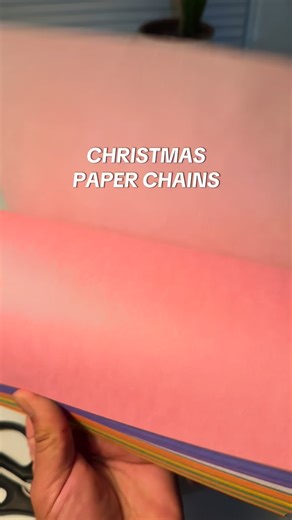 🌈DIY PAPER CHAINS Childhood core memory unlocked! I remember making these in kinder or 1st grade with my class. A festive and affordable way to create holiday decor that means something a little more. Supplies: -9"x12" construction paper -Scissors -Stapler or hot glue gun Instructions: -Fold each sheet in half then in half again dividing into 4 sections. -unfold, then cut along the creases. -form a circle with the first strip then secure with a stapler or a dab of hot glue. -use 4 strips of the