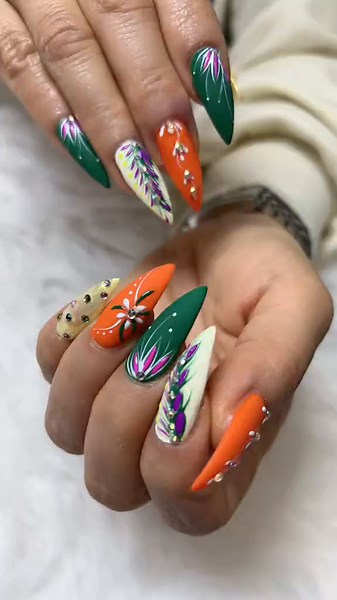 Bold, vibrant, and absolutely stunning! ✨ This handcrafted nail art is a perfect blend of elegance and creativity. Ready to elevate your nail game? Book your appointment today! ❤️💅 📍 New Style Nail Spa 1000 N. Green Valley pkwy , #530. Henderson. NV 89074 📞 702-802-5934 BOOK Online @ https://booking.salondragon.com/newstyle ##acrylicnails #fyp #hendersonnv #NewStyleNailSpa #springbreak #NailArt #foryoupage #LuxuryNails