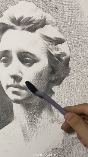 Graphite Drawing Art Gallery on Instagram: "This beautifully detailed graphite drawing exudes a classical elegance, reminiscent of sculptural forms. The artist's precise handling of light and shadow creates a soft yet powerful depiction of the subject, capturing a serene expression and delicate textures. An exemplary study in tonal variation and realism, this piece highlights the timeless allure of graphite art. ✍🏼🖤 drawing by LLL5266LLL #GraphiteDrawing #RealismArt #ClassicalArt #ArtCuratorFe