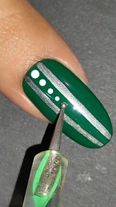 Green Metal Dotting Nail art designs #Geliner #easynailsathome #nailsonfleek #nailhacks #easynailtutorial #beginnernailtech #gelnails #gelnailsdesign #cutenaildesigns #nailart #greennails #greennailschallenge #easynailart #BTS #newnails #nailsofinstagram #nailinspo | SS nail art ideas