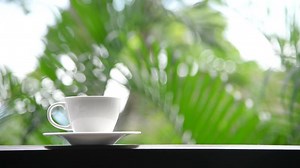 Download Coffee cup with outdoor view for free
