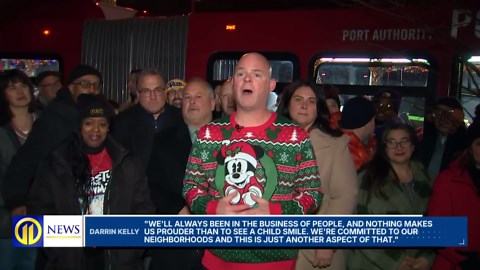 Union workers stuff PRT buses at toy drive in Pittsburgh