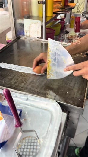 What is he drawing with an egg?