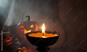 A glowing jack o' lantern with candles, illuminating the dark night with warm, flickering flames, creating a festive and romantic Halloween atmosphere
