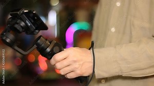 Using Gimbal with smartphone on street night bokeh Stock Video