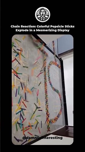 Chain Reaction: Colorful Popsicle Sticks Explode in a Mesmerizing Display