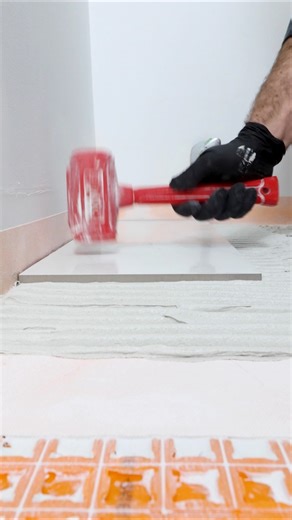 44K views · 176 reactions | Tile floor tips…I fill all the DITRA cavities with mortar then I apply more with my trowel. After I set the tile, I tap it with a rubber mallet and clean the edges. In toilet alcoves I ensure tiles are equidistant from the wall so that the final look is symmetric. For more tile tips visit homerepairtutor.com #tile #tilefloor #bathroomreno #homerenovation #homerepairtutor | Home Repair Tutor | Facebook