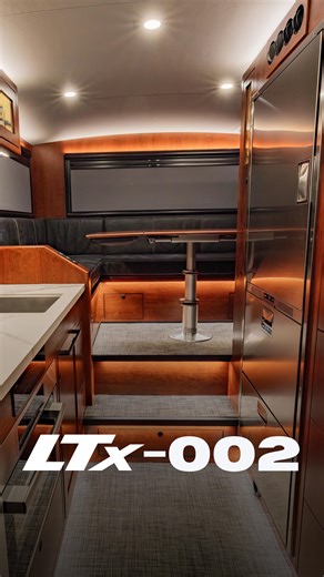 EarthRoamer on Instagram: "🚨 Just delivered: LTx-002 🚨 This build is loaded with custom-ordered features from top to bottom. It showcases gloss black exterior accents—including the bumpers, rear storage box, and wheels—paired with our signature X-Guard coating on the camper body. Inside, you’ll find custom ordered russet cherry wood cabinetry, a laser-etched backsplash reading “IN GOD WE TRUST”, and a custom-fit espresso machine with dedicated storage in the entry closet. Add in Quiet Ride dis