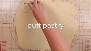 Puff pastry filled with Brie, cranberry sauce, and crispy bacon an easy, delicious appetizer.