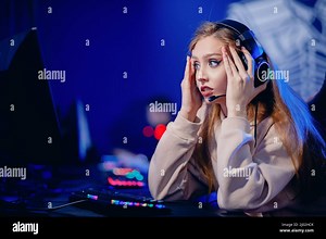 Facepalm streamer caucasian woman fail losing play gamer playing online video games computer emotions aggression, neon color Stock Photo - Alamy