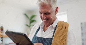 Man, tablet and laughing in kitchen with cooking dinner in apron or healthy nutrition or funny post, connection or humor. Elderly person, chef and home with internet recipe or joy, joke or retirement