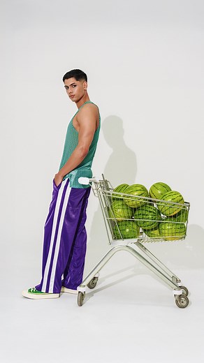 MODUS VIVENDI on Instagram: "Bold outfits. This look is for the rule-breakers. The Illusion Tank Top in vibrant neon combines a two-tone all-over print with soft, semi-transparent mesh. These items were built to stand out, designed to energise every look. Paired with our purple liquid-effect pants, this outfit drips with confidence—literally. The glossy finish and fluid texture of the pants reflect light and movement, making every step a moment. Click the link in bio to shop and to discover more