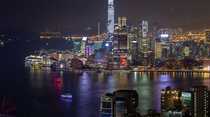 Urban city scape with flashing skyscraper - Free Stock Video