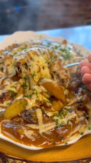 How to make French Onion Soup Poutine 🧅🍟 Smoked raclette, Gruyère Swiss-style, Yukon Gold scratch fries 🇫🇷🍁 Recipe: 1️⃣ Onion Base • Slice yellow onions and caramelize low & slow with a pinch of baking soda until deep golden. • Add a spoon of veal base. 2️⃣ Bone Marrow Stock • Coat 4 bone marrows with tomato paste. • Roast at 450°F until dark and caramelized. • Add to your onions and pour in beef broth (no wine needed). • Stir in ⅓ cup of flour to thicken. • Simmer until rich, glossy, and f