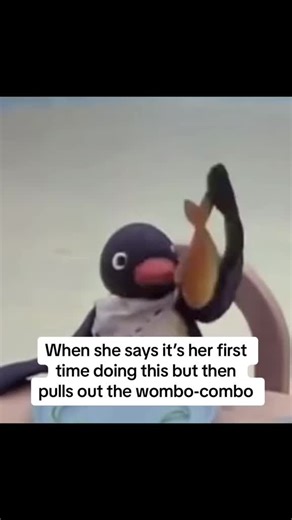 Black Penguin Puppet Balances Fish in Hilarious Performance