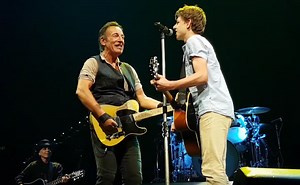 Bruce Springsteen invites teen on stage to play "Growing Up" -- watch