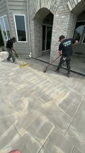 When sweeping polymeric sand into paver joints, sometimes the sand gets trapped at the top of the paver and will not make its way all the way to the bottom. Utilizing a roller compactor over the surface of the pavers ensures that we can be confident sand is completely packed between the bedding layer and the top￼ of the paver. | Creekside Outdoor Living | Facebook