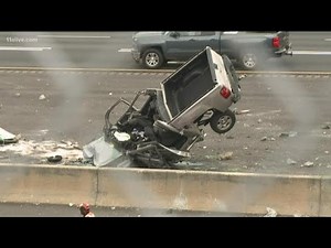 Person dies after truck crashes onto I-75 off overpass