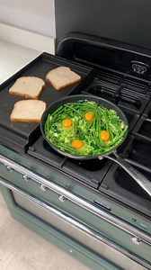 A spring green twist on shakshuka – a great way to use up some veg in your fridge! 🥦 1. Fry spring onions, garlic and chilli and mix in your favourite spring green veg 2. Once almost cooked through create small wells in the veg and crack your eggs into them to fry 3. Serve with some toasted sourdough. We used the teppanyaki griddle! #vegetarian #food #recipe | Rangemaster UK