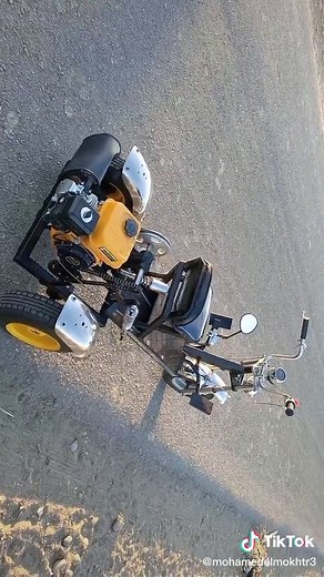 Three-Wheeled Motorcycle Showcase in Yellow and Black