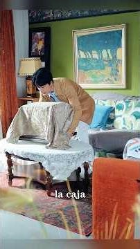 Inside the cardboard box the man bought, there is a tiny village.