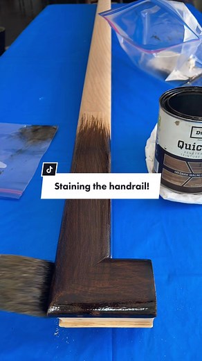 Staining the Hand Rail for a Stunning Staircase Makeover