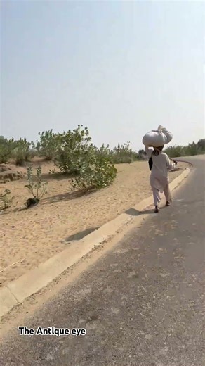 An Old Man Carrying a Load on His Head #foryou #shortvideo #voralshort