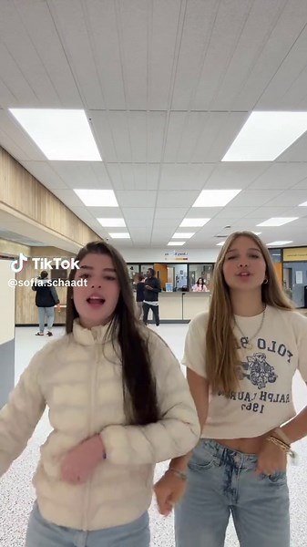 Synchronized Dance Routine by Two Young Women