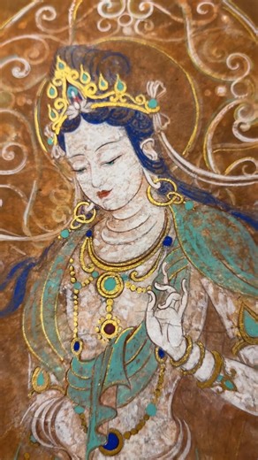 1.8K views · 52 reactions | Mineral pigments grind out millennia of hues, and ancient techniques craft the patina of time! This is a complete breakdown of how a Bodhisattva on paper replicates the texture of a cave mural— from mineral grinding to texture formation. Each step engages in dialogue with Dunhuang's timeless charm. #Dunhuang #SilkRoad #MeetDunhuang #IntangibleCulturalHeritage #DunhuangArt | Dunhuang | Facebook