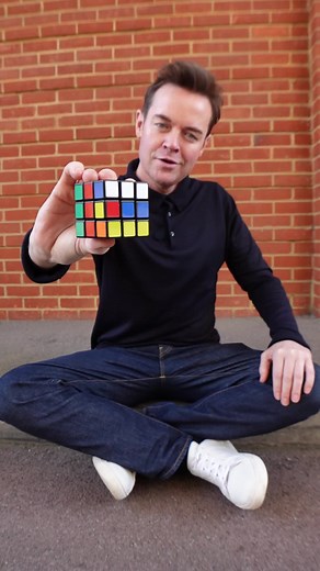 Magician Solves Rubik's Cube Without Camera Tricks