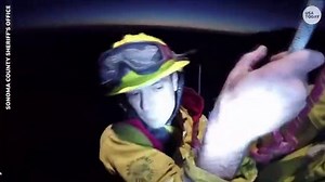 Video shows two trapped California firefighters being rescued from wildfires