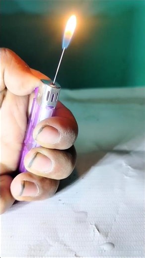 Gas lighter experiment with syringe needle