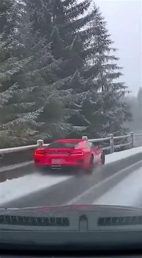 Sports Car Loses Control on Icy Curve