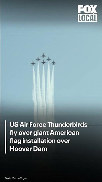 US Air Force Thunderbirds fly over giant American flag installation over Hoover Dam