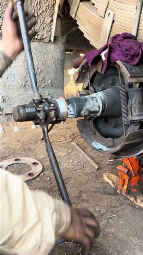 A great machinic repaired stripped thread of the spindle with hand cutting tools