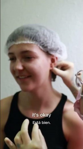 First Needle Ear Piercing Experience For A Young Woman