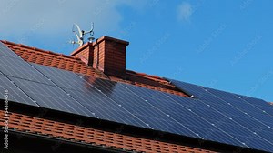 New ecologic house with solar panels Alternative to conventional energy. The battery is charged from a solar cell Advertisement Green energy Sustainable life Renewable alternative energy