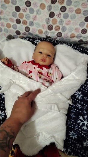 Ediee getting dresses in Xmas pjs day5