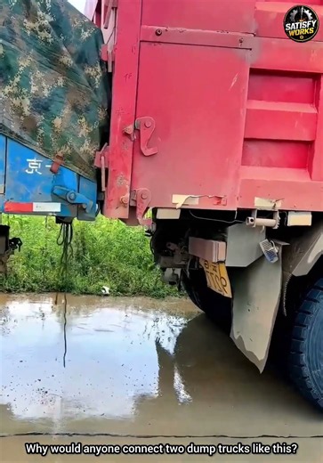 Why Are These Two Dump Trucks Connected Back-to-Back? 😱🚛
