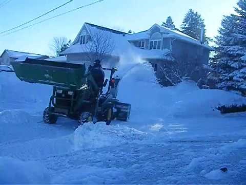 1025R with 60" rear mount snowblower