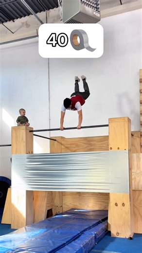 Calen Chan 陳 on Instagram: "How much duct tape can stop my swing?? 😅 #reels #challenge #ducttape #parkour #calenchan"